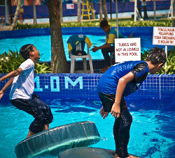 lifesaving class pool practice swimming in clothes